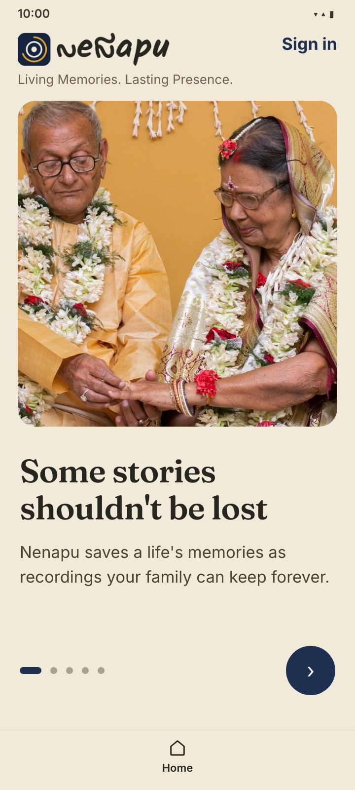 The Nenapu welcome screen — an elderly couple garlanded at their celebration, one tap to begin